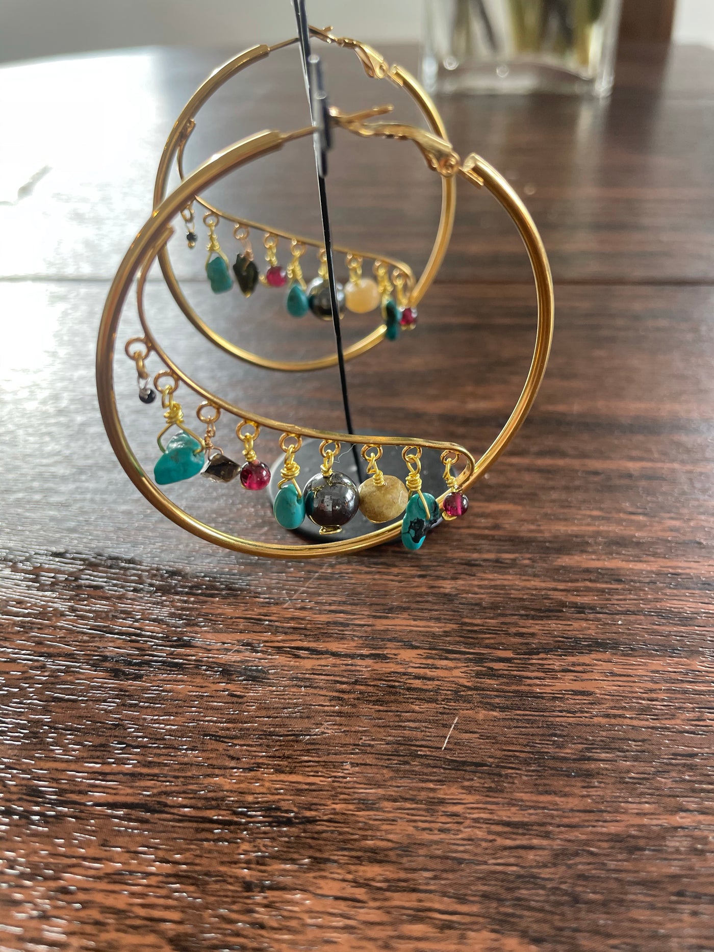 Gold Dangle Hoops with Multicolor Dangles.